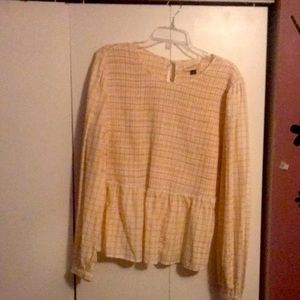 Only worn once it’s a pastel type of yellow.